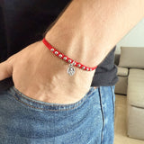 Pulsera Decenario Tejida con Medalla Plateada