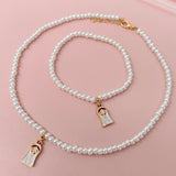 Collar y Pulsera de Perla Blanca Virgen Niña – VII Sacramentos Colombia
