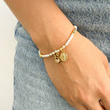 Pulsera de Perlas con Medalla de la Virgen – VII Sacramentos Colombia