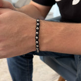 Pulsera Decenario Tejida con Balín de Acero Grande