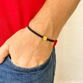 Pulsera Tejida con Medalla de San Benito en Baño de Oro