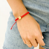 Pulsera Tejida con Medalla de San Benito en Baño de Oro