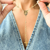 Rosario en Acero Dorado con Cuentas Facetadas