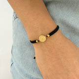 Pulsera Tejida con Medalla en Acero Dorado Pequeña