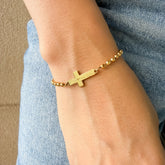 Pulsera Acero Dorado con cruz Padre Nuestro – VII Sacramentos Colombia