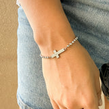 Pulsera Acero Plateado con cruz Padre Nuestro – VII Sacramentos Colombia