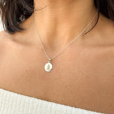 adena en Plata con Medalla de Ángel en Detalle Dorado - VII Sacramentos