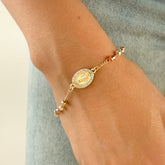 Pulsera Denario Tres Oros con Virgen Milagrosa Engastada – VII Sacramentos Colombia