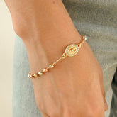 Pulsera Denario Tres Oros con Virgen Guadalupe Engastada – VII Sacramentos Colombia