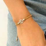 Pulsera Tejida con Cruz Circular en Plata 925 Engastada – VII Sacramentos Colombia
