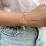 Pulsera Denario Corazones Resinados Blanco – VII Sacramentos Colombia