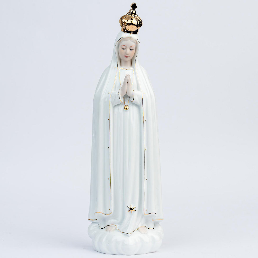 Estatua Virgen de Fátima de 33 cm en porcelana decorativa con corona dorada - VII Sacramentos Colombia