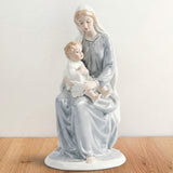 Estatua Virgen de la Piedad con el Niño Jesús de 22 cm en porcelana decorativa - VII Sacramentos Colombia