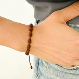 Pulsera Denario Franciscano en Hilo Marrón con Cruz de Madera - VII Sacramentos Colombia