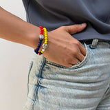 Pulsera rosario colombiana de doble vuelta en cristales amarillo azul rojo y cruz central _ VII SAcramentos
