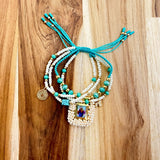 Pulsera Escapulario Azul con Mostacillas y Dijes de Fé - VII Sacramentos Colombia