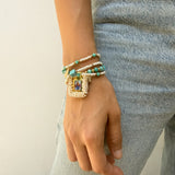 Pulsera Escapulario Azul con Mostacillas y Dijes de Fé - VII Sacramentos Colombia