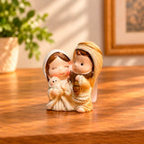 Nacimiento Nino en brazos acabado tipo porcelana 4.2 cm