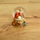 Bola de Nieve Nacimiento 6.5cm – Escena del Pesebre en Colores Pasteles